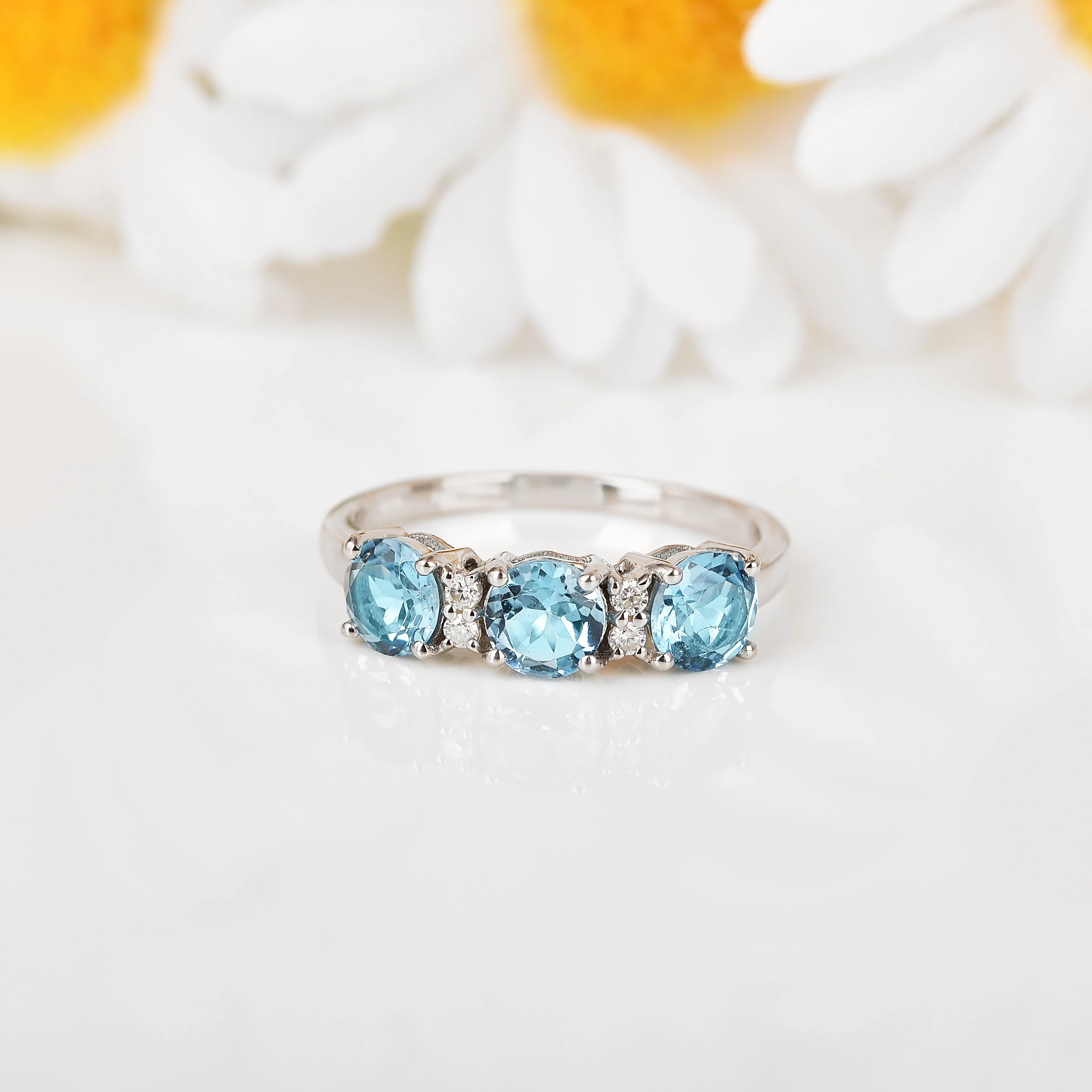 Blue Topaz Three Stone Ring